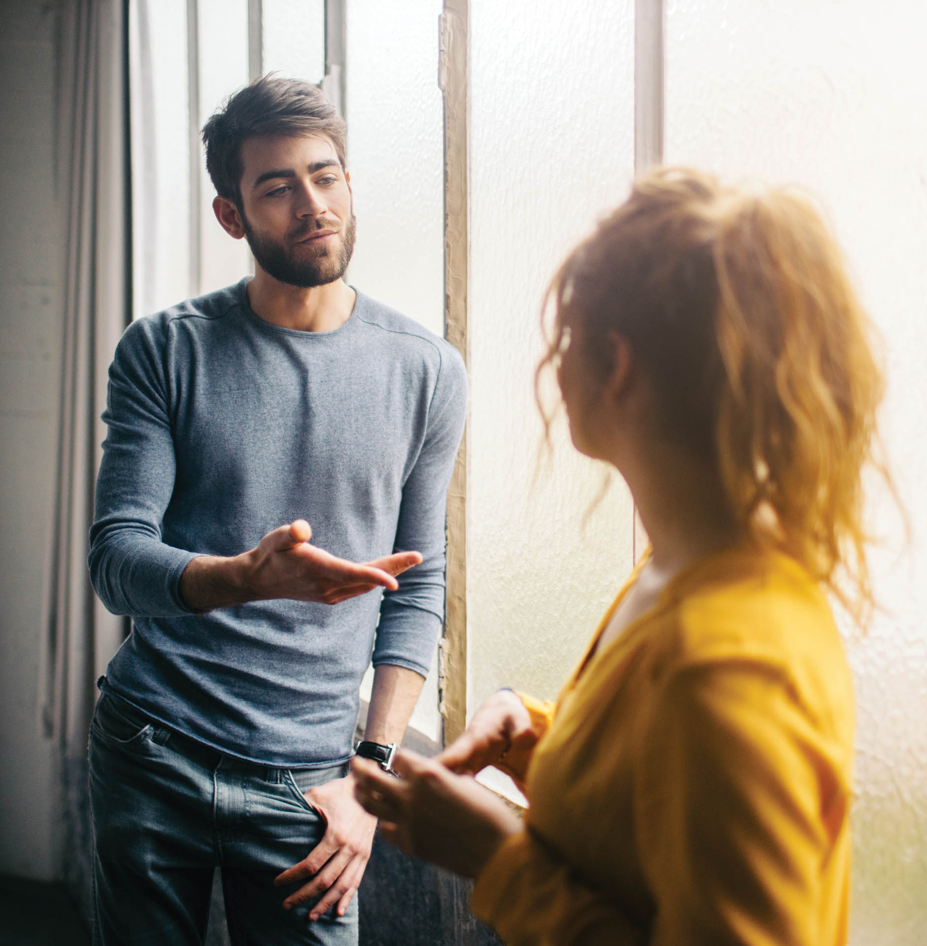 Two people talking.